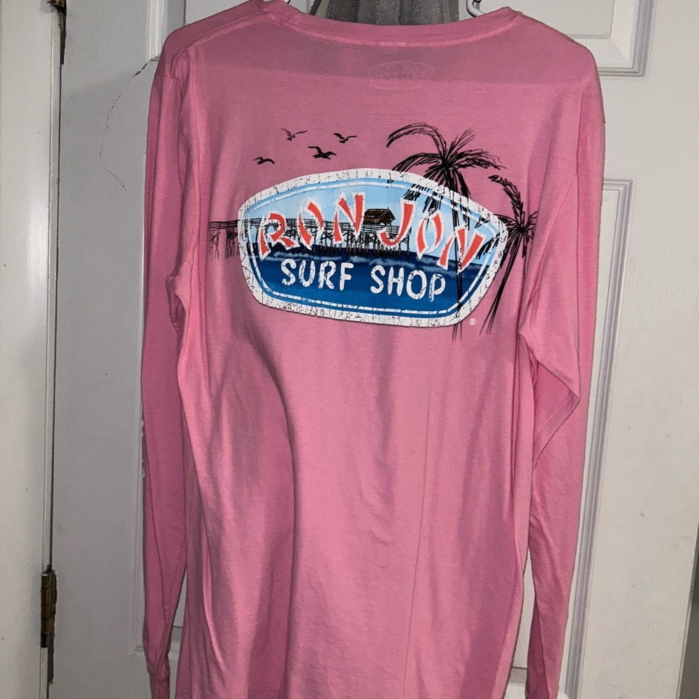 Brand new Ron Jon shirt. Still has tags SIZE MEDIUM